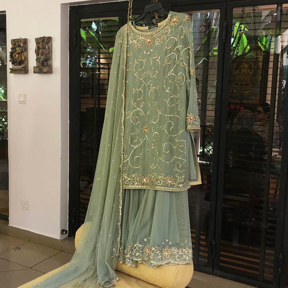 Clothing,Formal wear,Dress,Boutique,Gown,Fashion,Fashion design,Textile,Haute couture,Embroidery