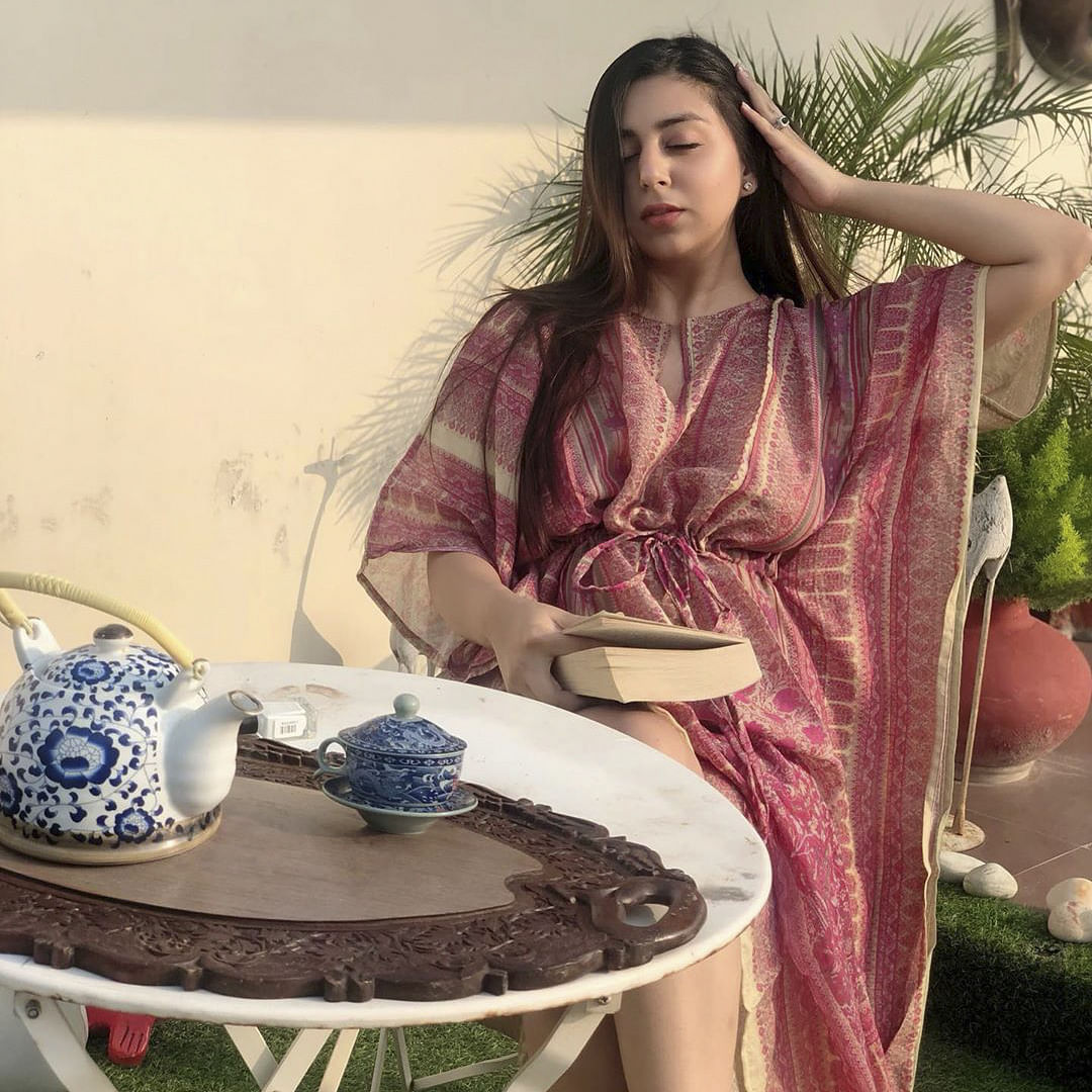 Sitting,Textile,Long hair,Photography,Photo shoot,Formal wear