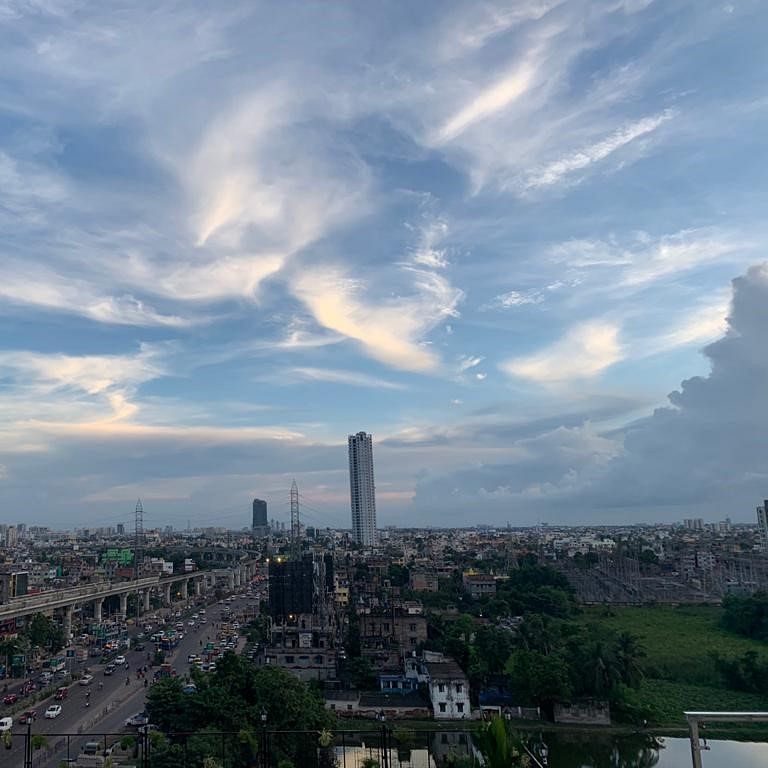 Sky,Metropolitan area,Cloud,Daytime,Urban area,Cityscape,City,Skyscraper,Morning,Skyline