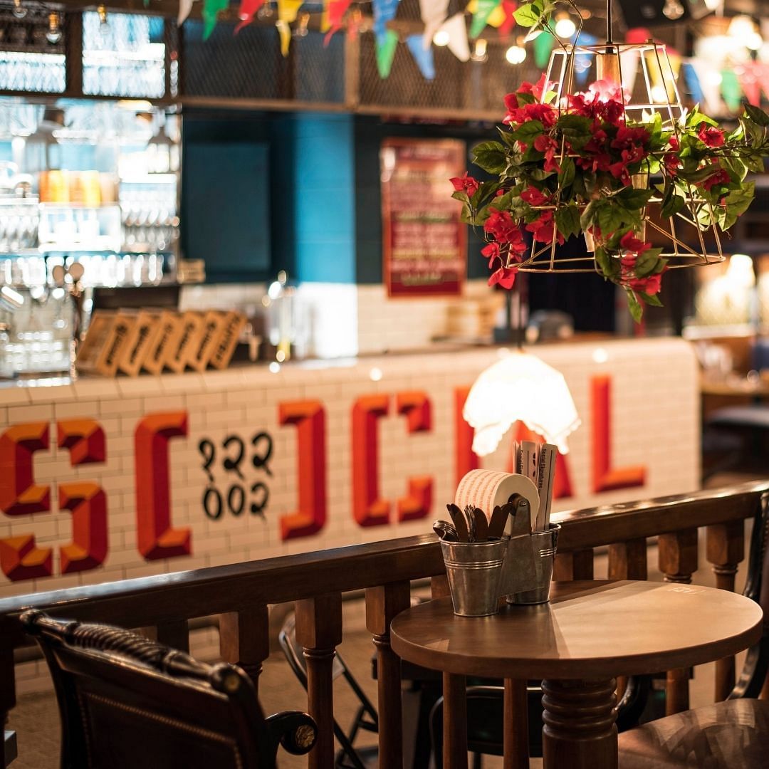 Table,Restaurant,Room,Iron,Furniture,Interior design,Architecture,Coffeehouse,Building,Plant