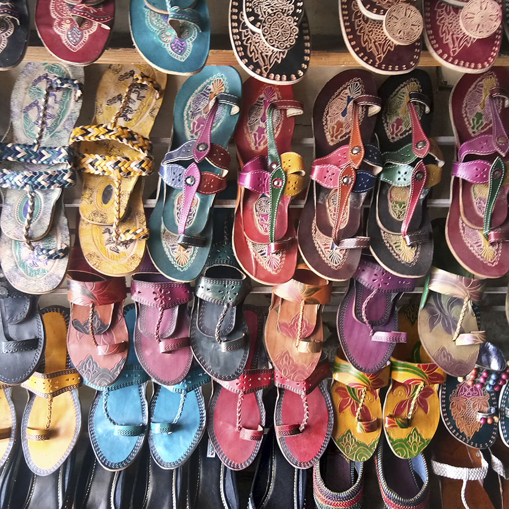 Footwear,Shoe,Pink,Collection,Slipper,Fashion accessory,Souvenir,Selling,Shoe store