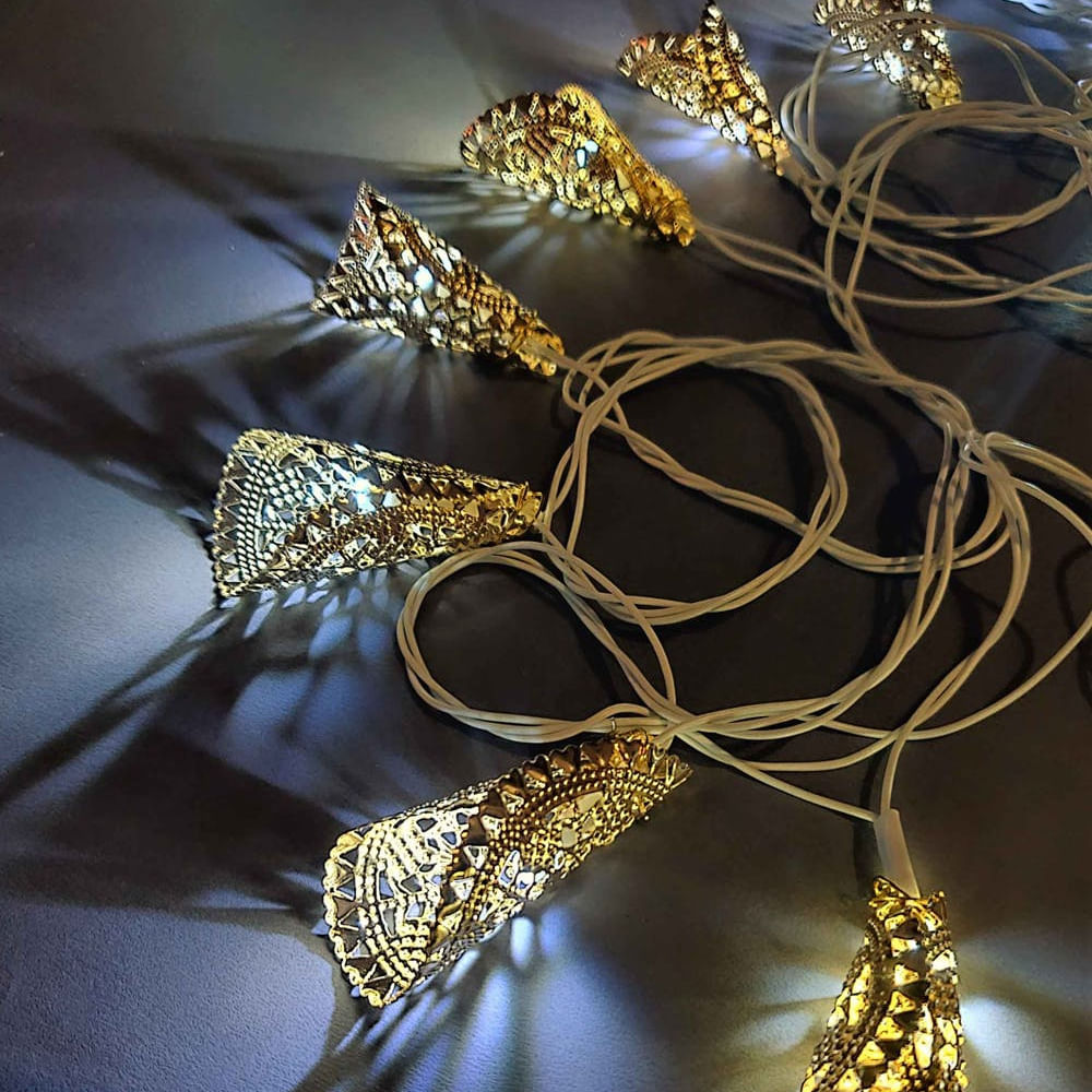 Metal,Gold,Fashion accessory,Jewellery,Plant