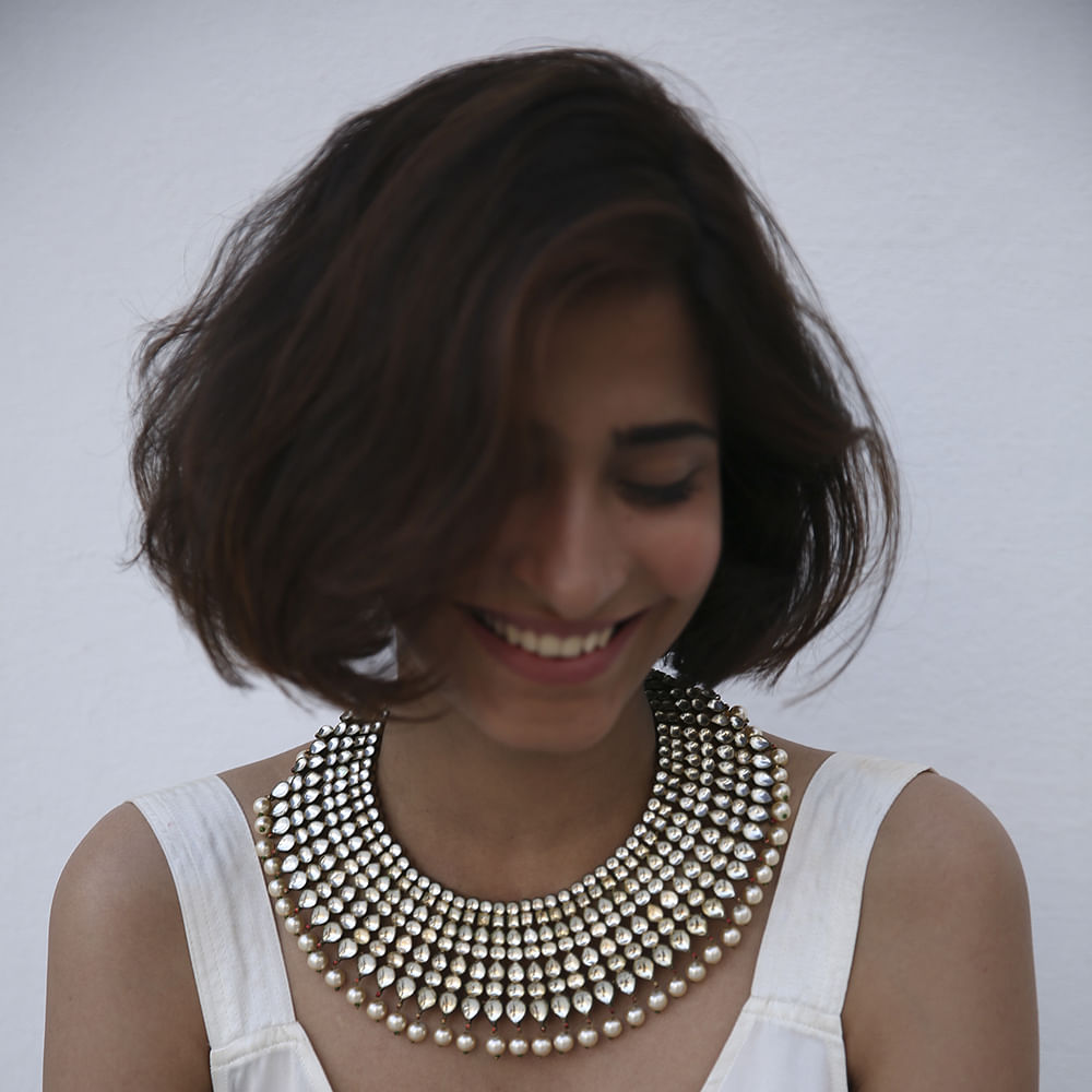 Hair,Necklace,Hairstyle,Neck,Beauty,Bob cut,Chin,Lip,Brown hair,Fashion accessory