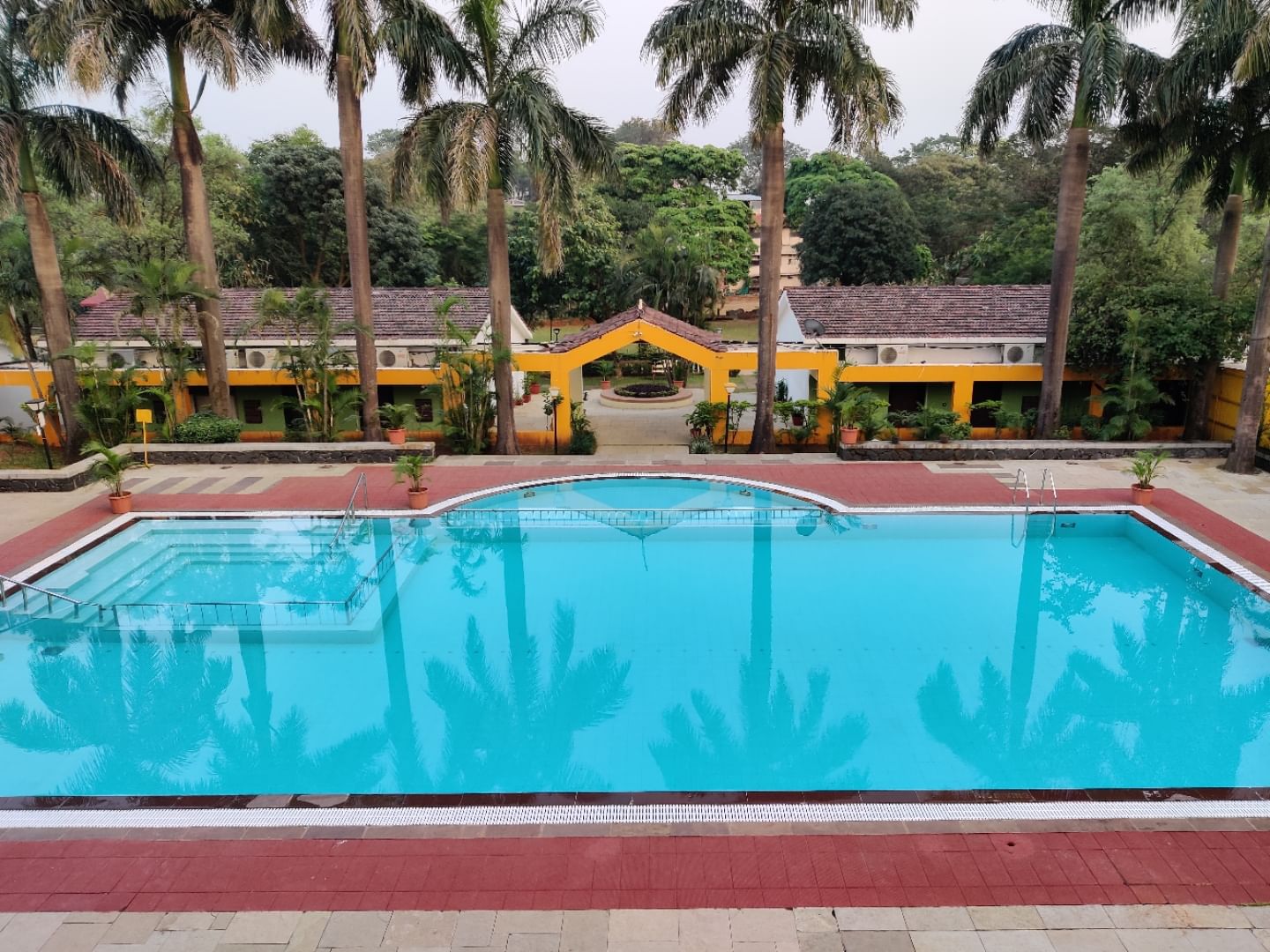 Swimming pool,Property,Resort,Leisure,Vacation,Real estate,Water,Hacienda,House,Building