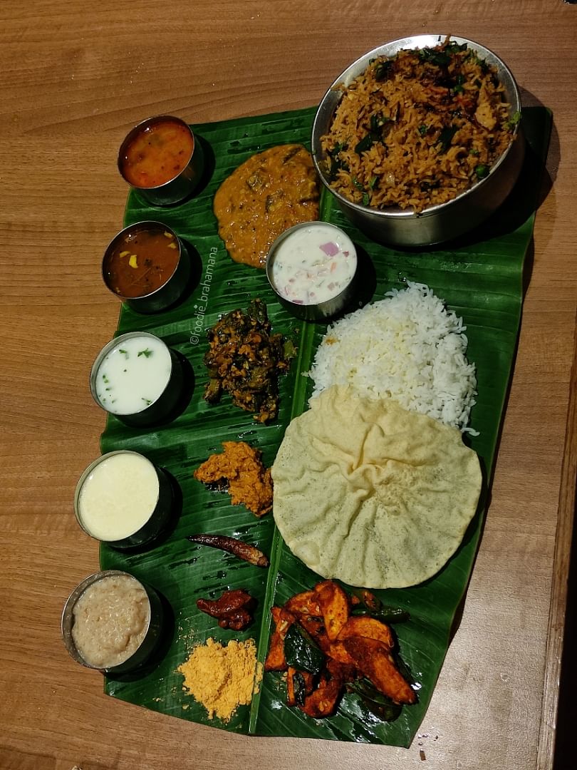 Wood,Banana leaf rice,Food,Cuisine,Dish,Ingredient,Meal,Tableware,Rice,Recipe