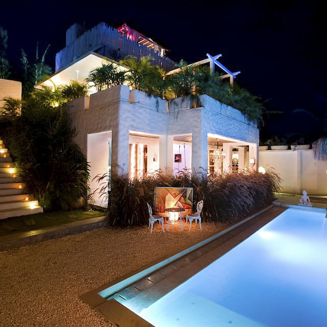 Property,Home,House,Lighting,Real estate,Building,Light,Landscape lighting,Swimming pool,Residential area