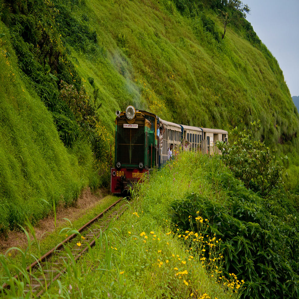 Transport,Nature,Green,Highland,Vehicle,Vegetation,Rolling stock,Hill station,Natural landscape,Track