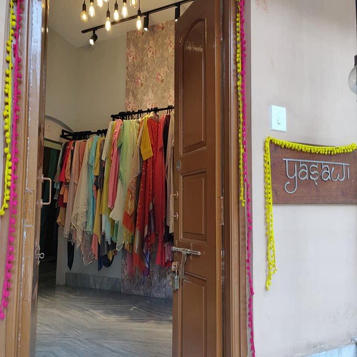 Room,Boutique,Textile,Furniture,Closet,Door,Building