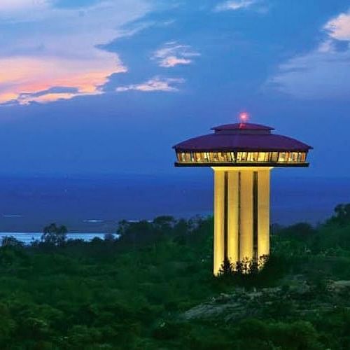 Sky,Landmark,Blue,Observation tower,Cloud,Sea,Architecture,Calm,Horizon,Hill