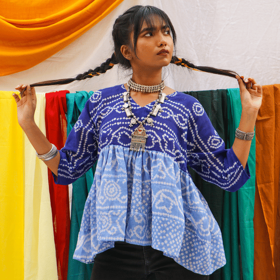 Clothing,Fashion,Formal wear,Electric blue,Sleeve,Textile,Blouse,Fashion design,Neck,Top