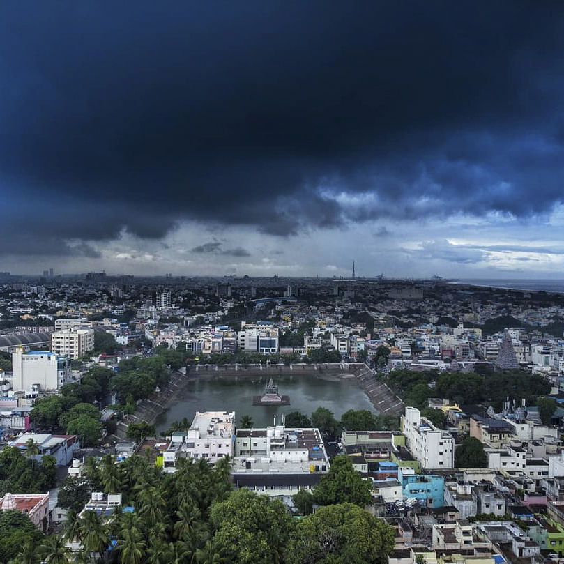 Sky,Cloud,Urban area,Metropolitan area,City,Cityscape,Daytime,Human settlement,Town,Atmosphere