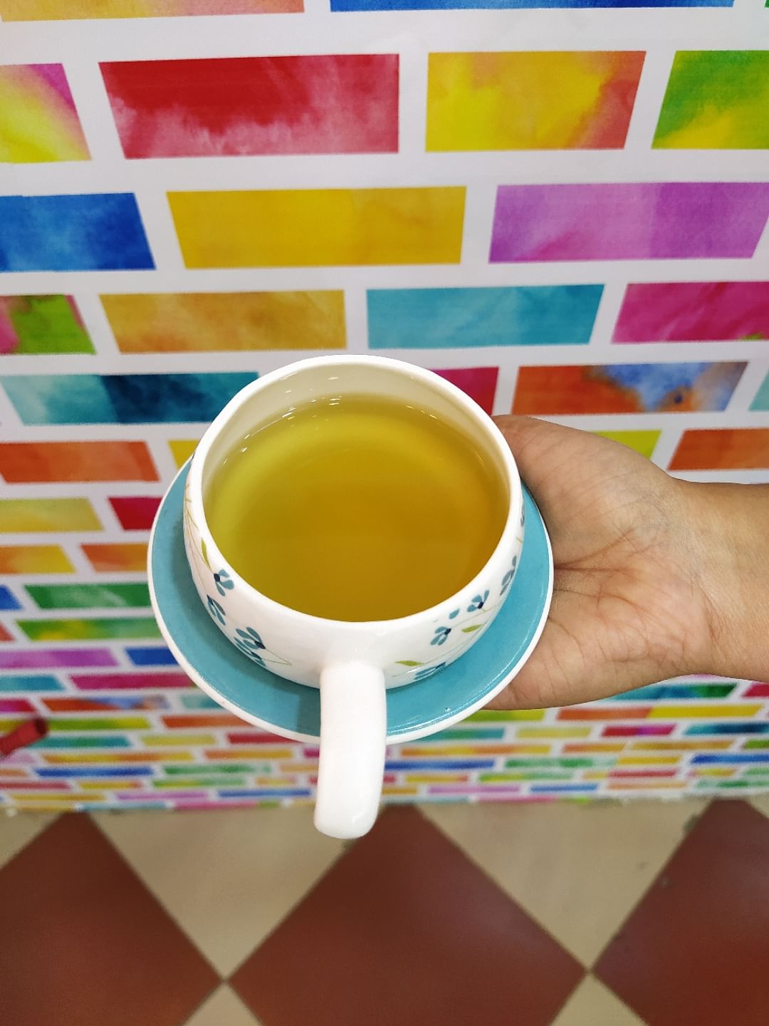 Serveware,Drinkware,Yellow,Cup,Dishware,Drink,Ingredient,Tableware,Colorfulness,Tea