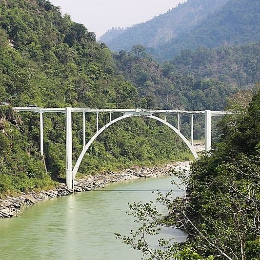 Nature,Bridge,Water resources,Waterway,Arch bridge,Highland,Watercourse,Bank,Channel,Mountain range