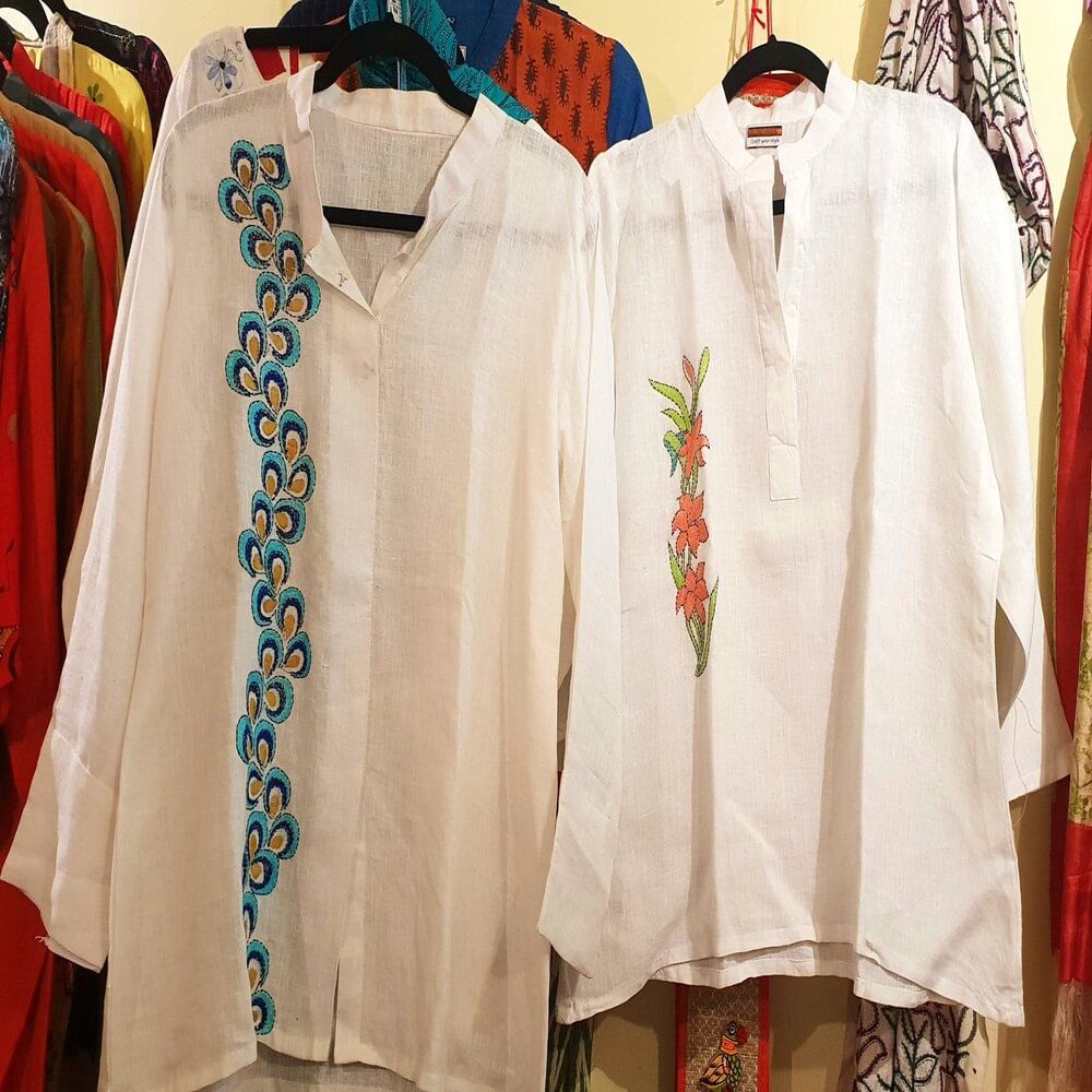 Textile,Collar,Clothes hanger,Fashion,Retail,Fashion design,Boutique,Collection,Home accessories,Outlet store