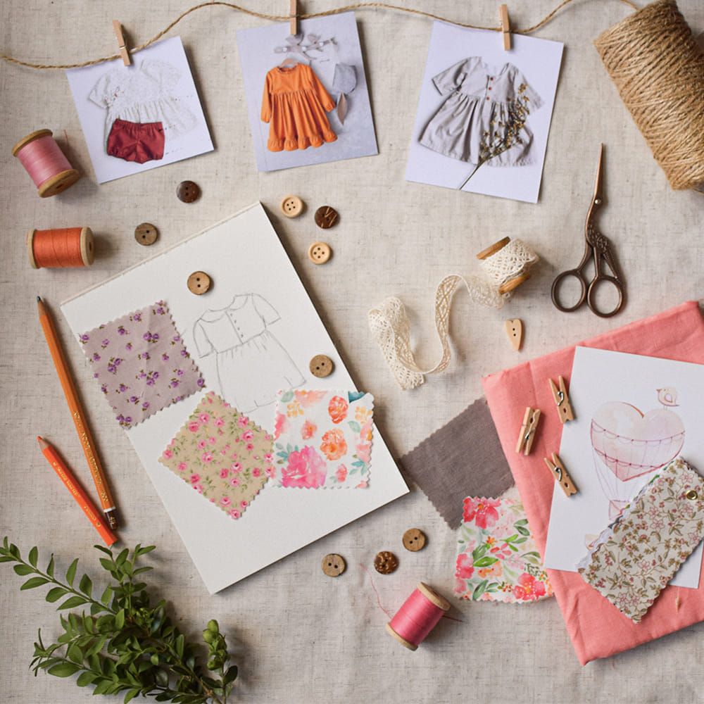 Textile,Paper product,Peach,Stationery,Wicker,Craft,Paper,Creative arts,Earrings,Home accessories