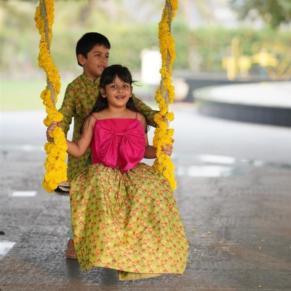 Yellow,Happy,People in nature,Child model,One-piece garment,Day dress,Tradition,Lei