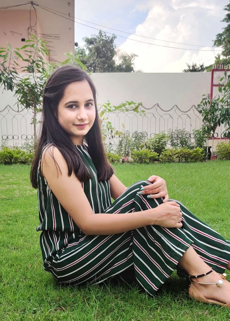 Grass,Sitting,Beauty,Summer,Lawn,Long hair,Grass family,Leg,Leisure,Smile