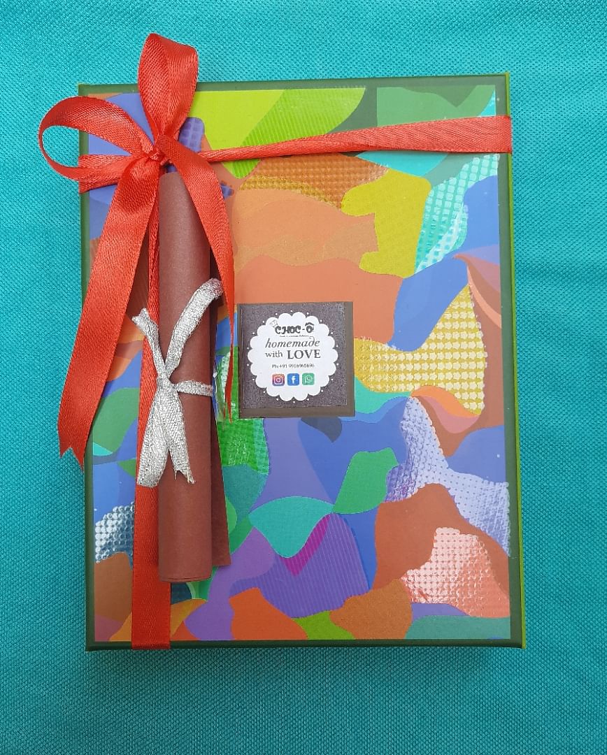 Present,Turquoise,Ribbon,Paper,Art paper,Construction paper,Gift wrapping,Paper product,Rectangle,Art