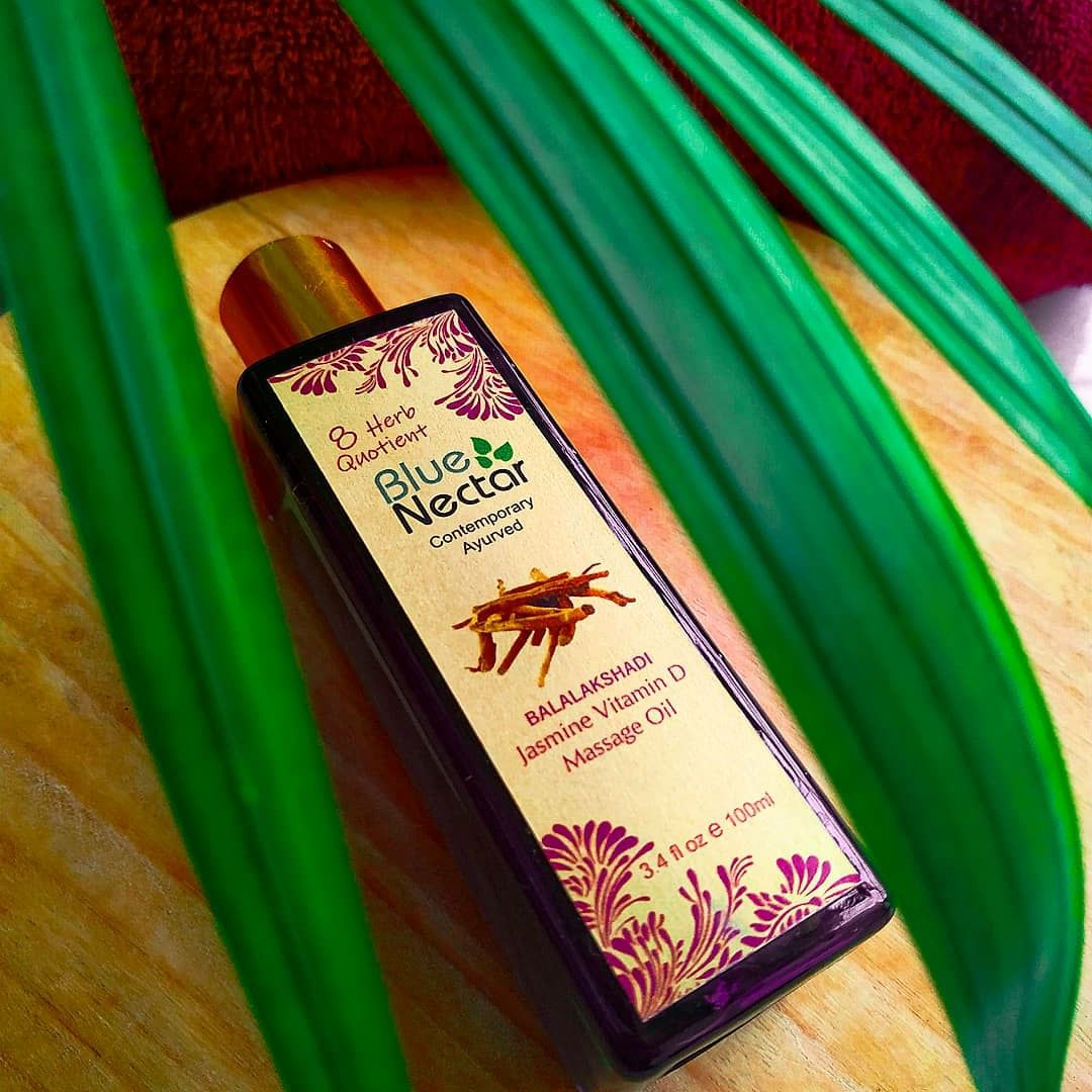 Wood,Bottle,Glass bottle,Wood stain,Liquid,Tints and shades,Rectangle,Plant,Font,Drink