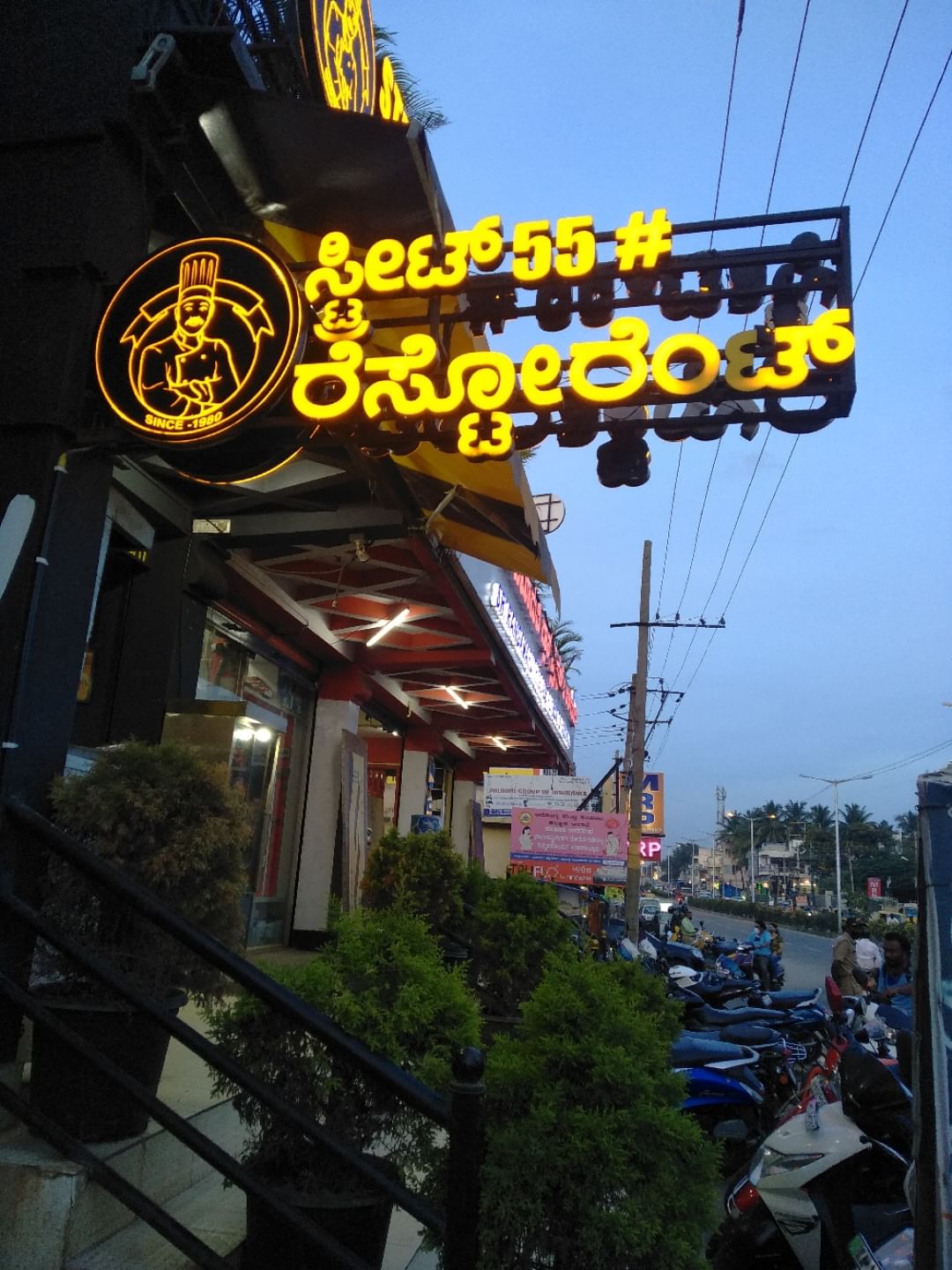Sky,Architecture,Signage,Tourism,City,Leisure,Street,Night,Building,Sign