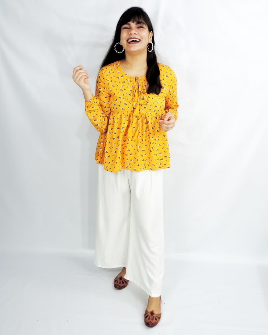 Clothing,White,Yellow,Orange,Formal wear,Pajamas,Neck,Suit,Sleeve,Fashion model