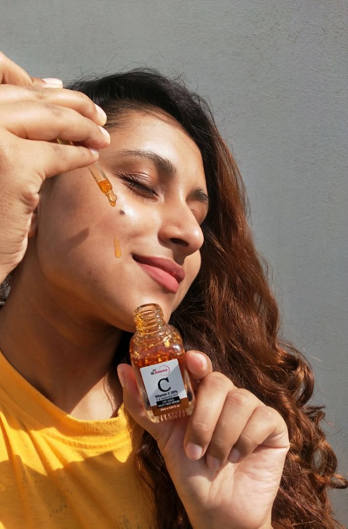 Face,Skin,Lip,Beauty,Nail,Liqueur,Neck,Long hair,Finger,Brown hair