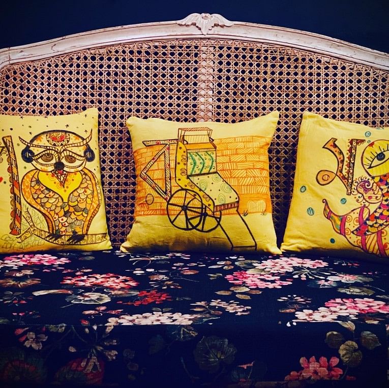 Textile,Linens,Purple,Orange,Pattern,Cushion,Creative arts,Visual arts,Pillow,Home accessories