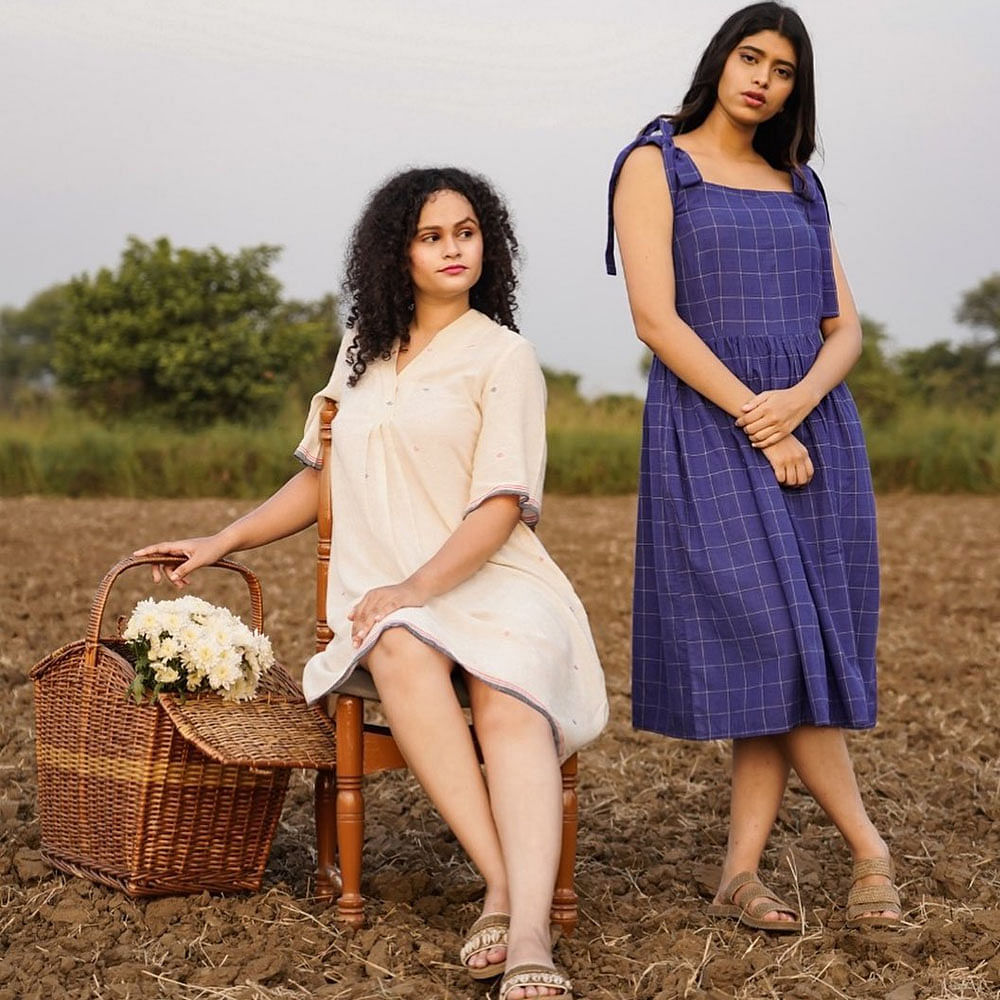 Hair,Footwear,Shoe,Sky,One-piece garment,Shoulder,People in nature,Dress,Flash photography,Sleeve