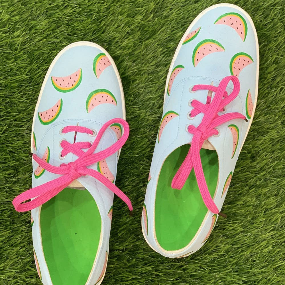 Footwear,Shoe,Pink,Font,Grass,Outdoor shoe,Sneakers,Walking shoe,Magenta,Flip-flops