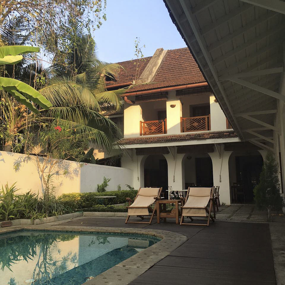 Water,Plant,Building,Sky,Window,Lighting,Chair,Architecture,Shade,Swimming pool