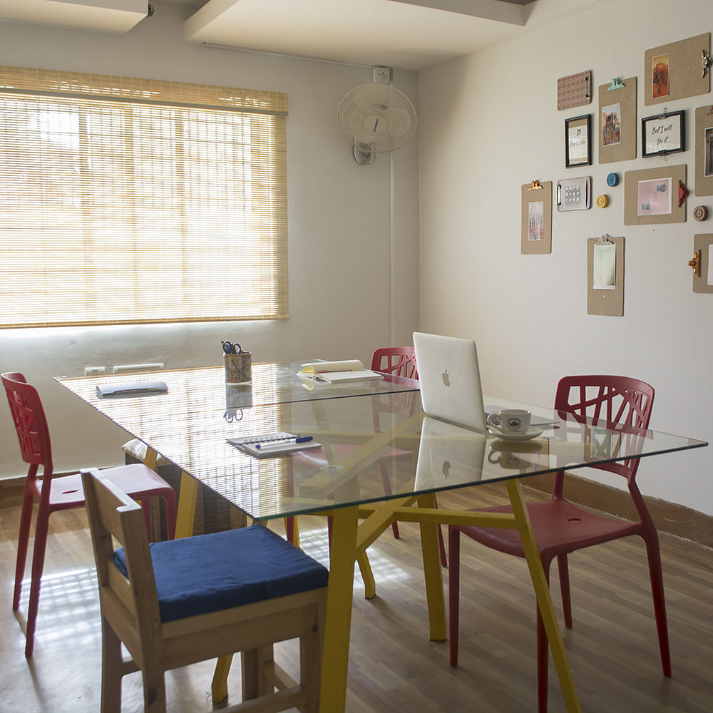 Table,Furniture,Picture frame,Chair,Window,Building,Wood,House,Laptop,Interior design