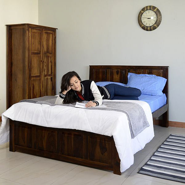 Furniture,Property,Comfort,Wood,Bed frame,Interior design,Clock,Floor,Bed,Building