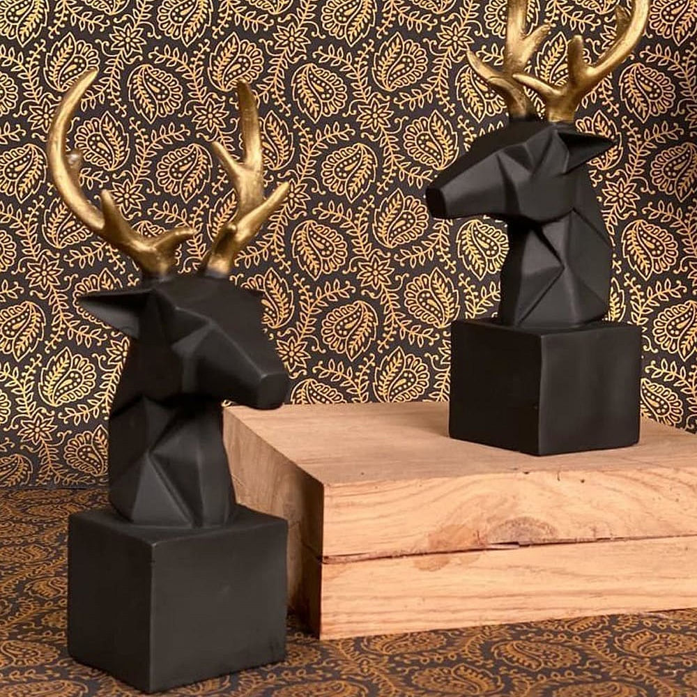 Brown,Wood,Natural material,Art,Statue,Wall,Fawn,Sculpture,Horn,Creative arts