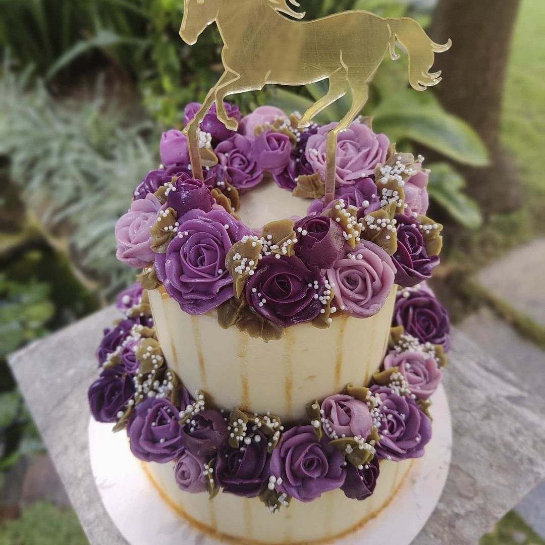 Flower,Food,Cake decorating,Cake,Purple,Petal,Horse,Cake decorating supply,Plant,Ingredient