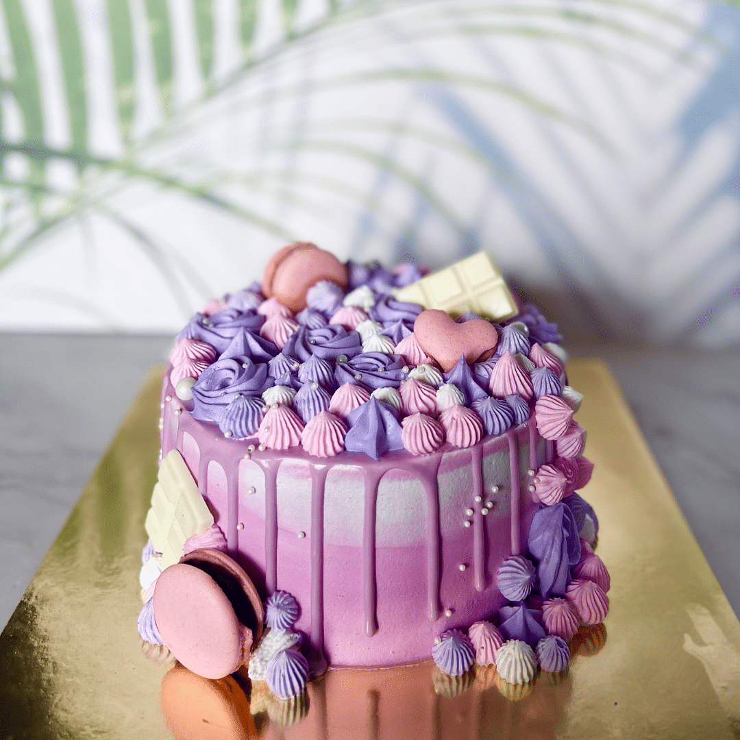 Food,Cake decorating,Cake decorating supply,Cake,Purple,Ingredient,Plant,Recipe,Baked goods,Petal