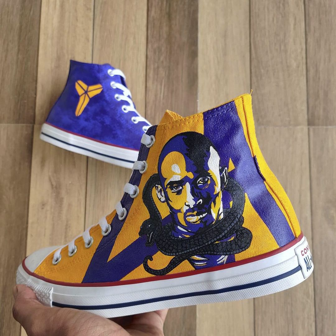 Footwear,Walking shoe,Cap,Sportswear,Sneakers,Font,Electric blue,Outdoor shoe,Athletic shoe,Hat