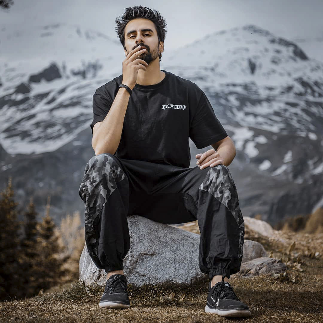 Shoe,Leg,People in nature,Human,Flash photography,Mountain,Happy,Beard,Landscape,Black hair