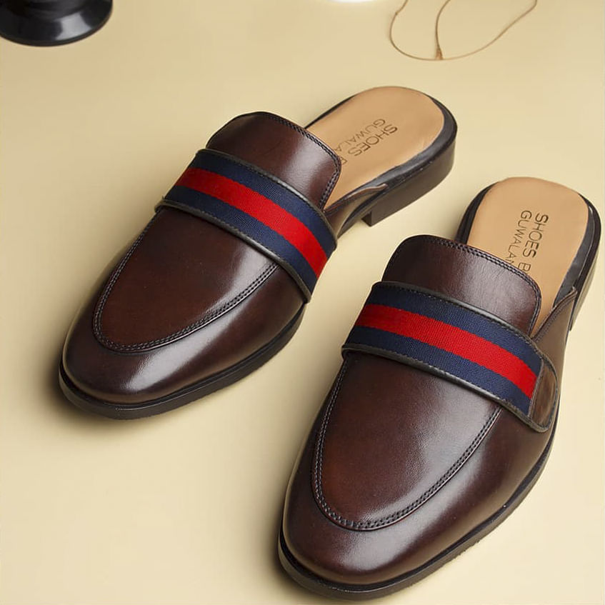 Footwear,Brown,Shoe,Material property,Font,Fashion design,Athletic shoe,Magenta,Leather,Carmine