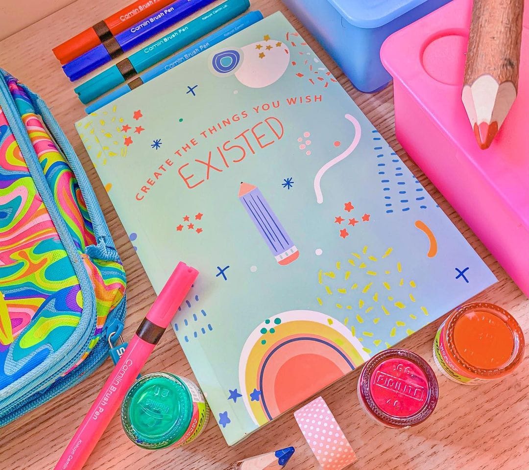 Table,Textile,Writing implement,Art,Office supplies,Stationery,Paint,Recreation,Pattern,Chair