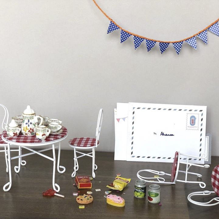 Table,Product,Textile,Interior design,Lighting,Line,Wheel,Font,Art,Event