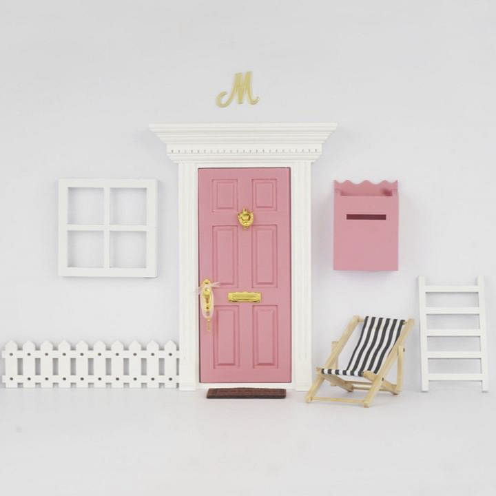 Door,Rectangle,Wood,Font,Home door,Dead bolt,Door handle,Chair,Fixture,Magenta