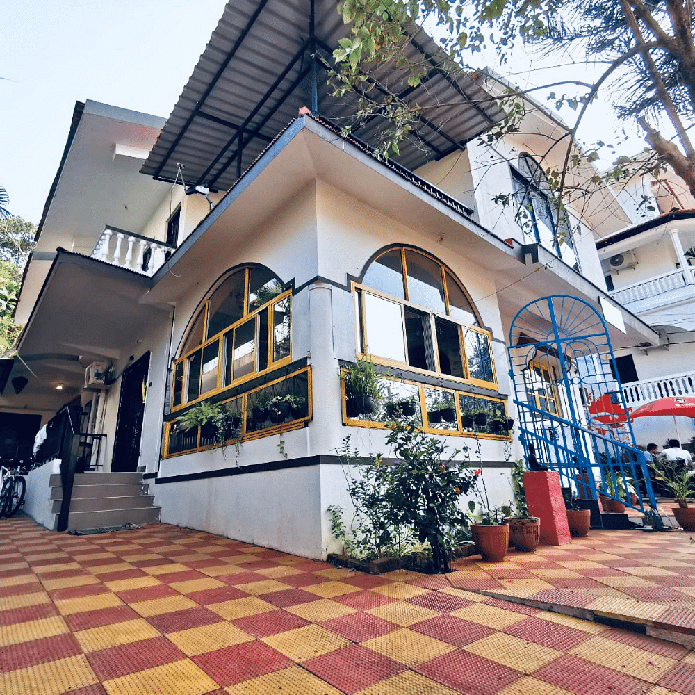 Building,Plant,Window,Architecture,Urban design,Shade,Flowerpot,Neighbourhood,Condominium,Leisure