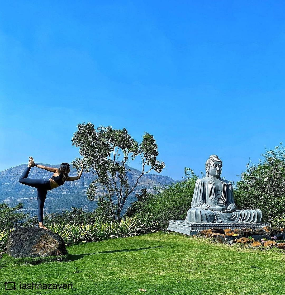 Sky,Plant,Tree,Natural landscape,Cloud,Sculpture,Vegetation,Statue,Art,People in nature