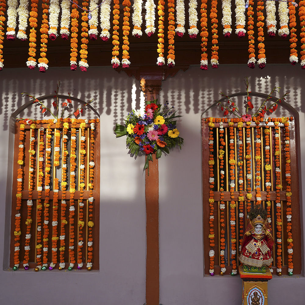 Flower,Product,Amber,Gold,Event,Religious item,Art,Wood,Place of worship,Temple