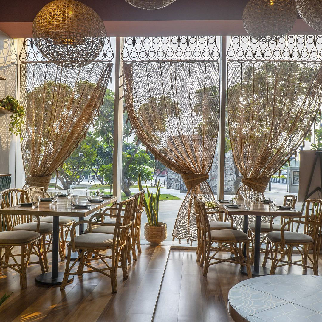 Table,Furniture,Plant,Chair,Decoration,Textile,Architecture,Interior design,Shade,Yellow