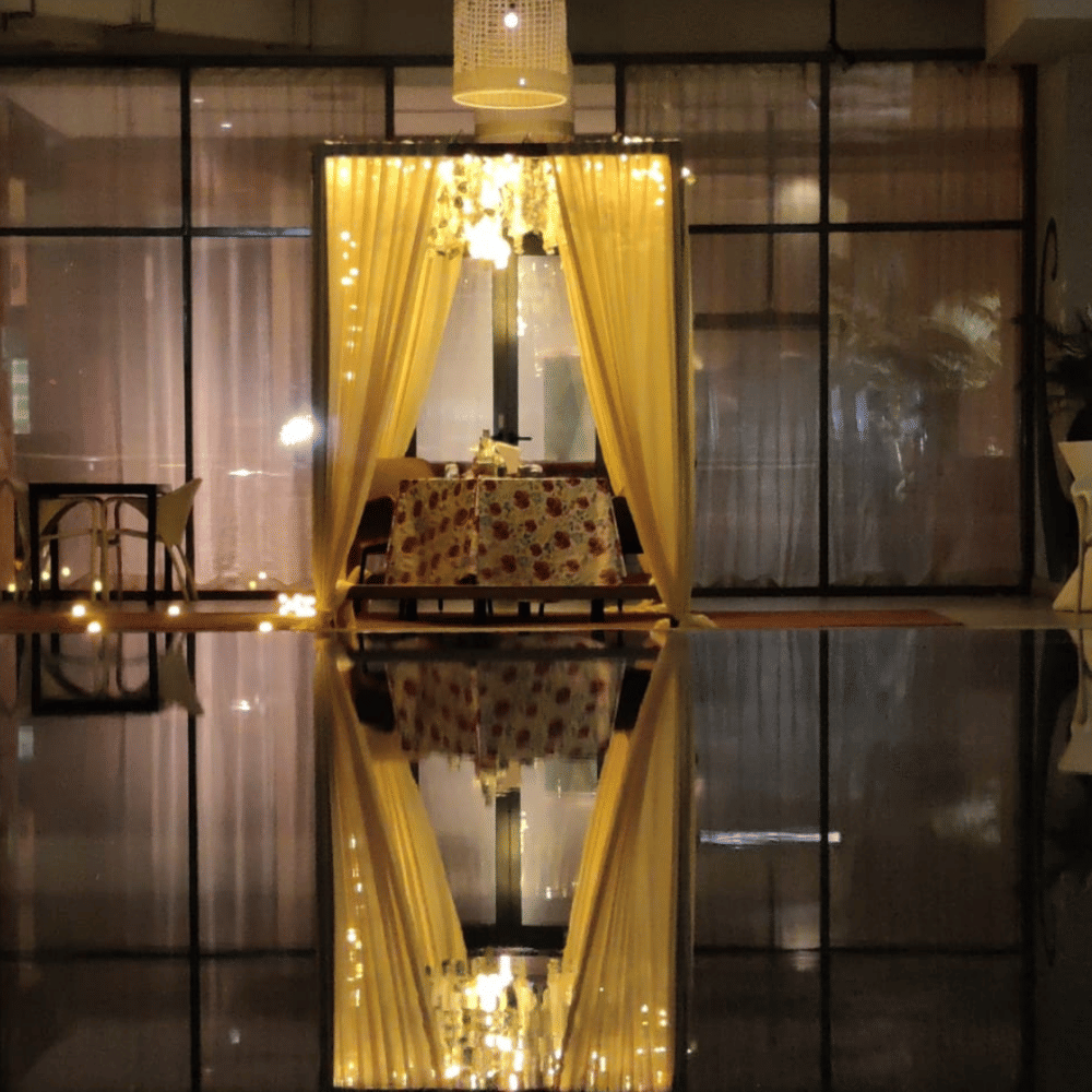 Building,Light,Amber,Gold,Lighting,Interior design,Architecture,Door,Wood,Curtain