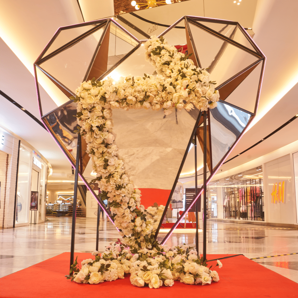 Flower,Plant,Decoration,Light,Lighting,Orange,Interior design,Flooring,Building,Art