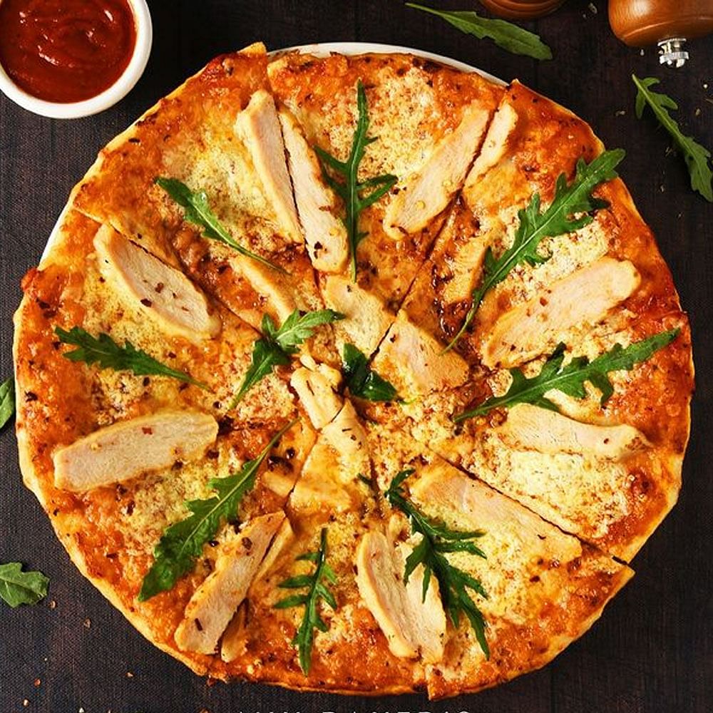 Food,Pizza,Ingredient,Recipe,Cuisine,Tomato sauce,Garnish,Pizza cheese,Dish,Baked goods