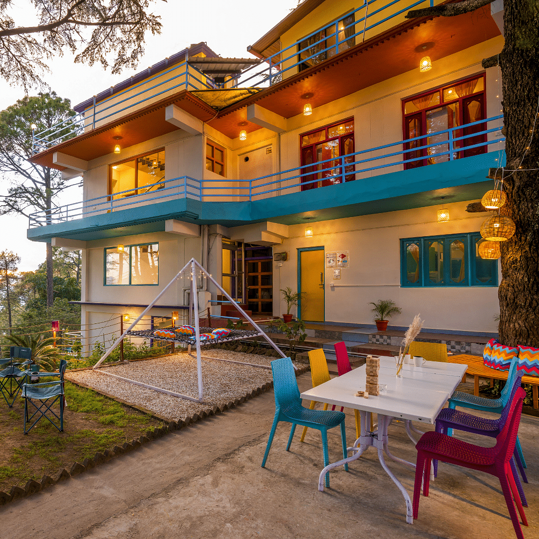 Building,Property,Window,Plant,Sky,Table,Stairs,Shade,Door,House