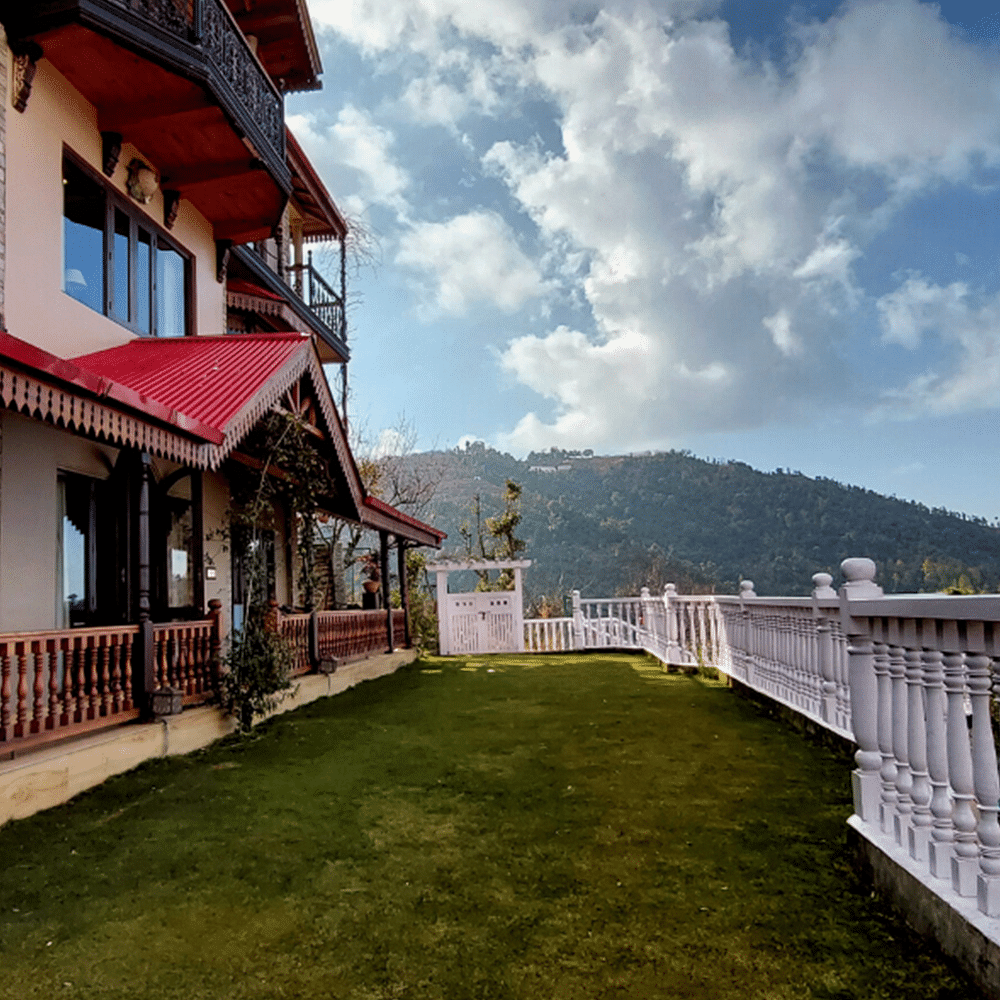 Cloud,Sky,Plant,Building,Architecture,Land lot,Wood,Window,Grass,Fence